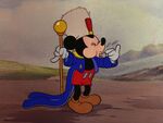 Mickey blowing a whistle
