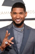 Usher attending the 57th annual Grammy Awards in February 2015.