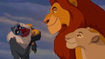 Infant Simba with his parents and Rafiki