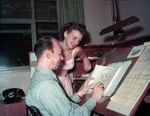 Marc Davis showing Woods his sketch of Cinderella, c. 1949.