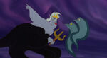"After him!" Angered by Eric, she commands Flotsam and Jetsam to sick him.