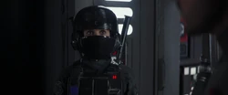 Jyn, in disguise, infiltrating the Citadel Tower on Scarif.