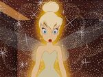 Tinker Bell shocked when she hears that Wendy wants to kiss Peter.