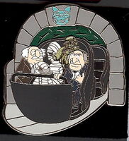 Statler and Waldorf with a mummy and a deaf ghost in a Haunted Mansion Doombuggy pin