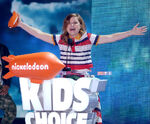 Amy Poehler receiving her award for "Favorite Voice for Animated Movie" during the 2016 Nickelodeon Kids' Choice Awards.