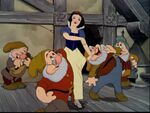 Snow White and the dwarfs dancing