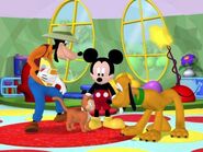 Goofy introducing Mr. Pettibone to Mickey and Pluto