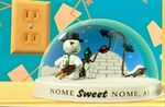 Knick in his Nome Sweet Nome snow globe