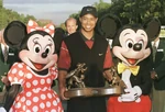 Tiger-Woods-1999-National-Car-Rental-Golf-Classic.jpg (76 KB) Tiger with Mickey Mouse and Minnie Mouse