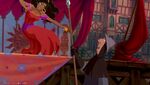 Esmeralda grabs the soldier's spear