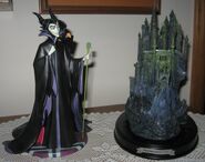 Maleficent (left) and Forbidden Mountain (right) from the WDCC