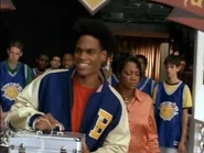 Rondel, his teammates, and his mother coming to help Calvin out with Tyco's grooming