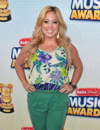 Sabrina Bryan attending the 2013 Radio Disney Music Awards.