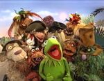 Kermit with Polly Lobster, Mad Monty, Clueless Morgan, Big Snort and the rest of the crew from Muppet Treasure Island in Muppet Sing-Alongs Muppet Treasure Island