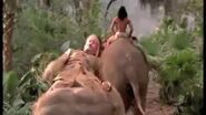 Colonel Brydon reluctantly riding an elephant back to safety to the village.