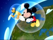 Mickey and Pluto floating away