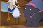 Mr. Stork presenting Dumbo to Mrs. Jumbo
