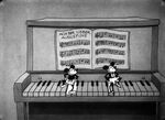 The mice playing the piano.