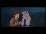 Taran and Eilonwy laugh at Gurgi's antics