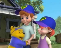 Christopher Robin in the  episode/segment,  while being hugged by , next to 