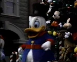 ScroogeAt1996XmasParade.jpg (25 KB) Scrooge as he appeared at the Disney parks in the mid-1990s.