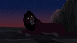 Kovu looks up surprised when Simba approaches him.