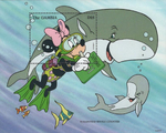 Minnie scuba diving with Dwarf Sperm Whales in her bikini