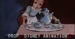 Clarice serving tea to Gaston.