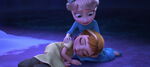 Elsa holding Anna