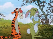 Rabbit scolding Tigger, when he believes Eeyore being bounced into the river was Tigger's fault.