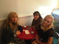 With Peyton List and a fan.