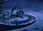 Lucifer lands in the fountain.