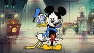 Blissful Donald hugs Mickey.jpg (116 KB)