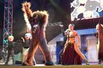 The slave version of Princess Leia Organa dances with Chewbacca and others during the Hyperspace Hoopla at Star Wars Weekends in Disney's Hollywood Studios.