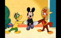 José joins Panchito in vigorously shaking Mickey's hands. Mickey seems to be enjoying it.