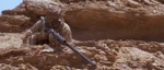 A Tusken aiming its Cycler rifle