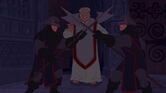 But Frollo's guard block his way.