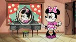 Minnie wearing her pink polka-dotted bow and dress in the Mickey Mouse episode, "Eau de Minnie"
