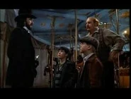 Carasaul.jpg (7 KB) Mr. Dark in front of Mr. Copper, Will Halloway, and Jim Nightshade at the Carousel