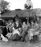 Walt Disney on the set with Dorothy McGuire, Fess Parker, and Robert Stevenson for "Old Yeller".