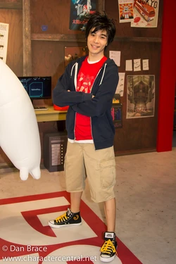 Hiro posing for a photo at the Disney parks.