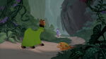 Kuzco stares in shock as he watches Yzma and Kronk leave