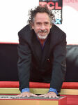 Tim Burton poses at his Chinese Theatre Handprint ceremony in September 2016.