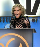 Jane Fonda speaks onstage with her Stanley Kramer Award during the 30th annual Producers' Guild Award in January 2019.
