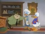 The Colonel meeting Daisy and Donald impersonating as Klebb and Horst