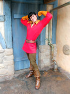 2013-2020: Gaston's pants, belt and boots are now brown, his gloves are a lighter brown and he no longer wears an ascot around his neck, looking closer to how he appears in the film.