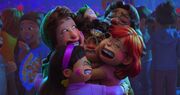 Mei and her friends hugging Tyler
