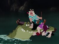 Smee watching Hook on the mouth of the Crocodile