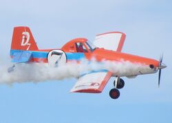Air Tractor AT-400A painted as Dusty performing at the 2013 EAA AirVenture Oshkosh, where the film had a special screening