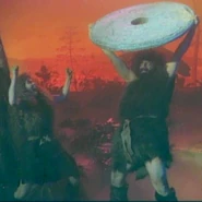 Cavepeople inventing the hula hoop in "Mighty Megalosaurus"